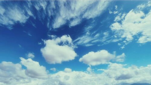 Stunning Blue Sky with Fluffy White Clouds 4K Desktop Wallpaper