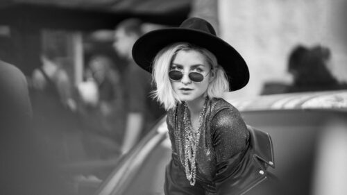 Stylish Blonde Woman in Fedora and Sunglasses Black and White Desktop Wallpaper