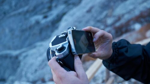 Close-Up of Photographer Capturing Vintage Camera Viewfinder PC Wallpaper