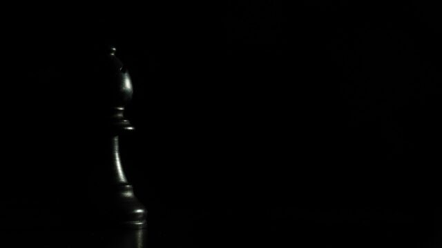 Minimalist Black Chess Bishop Piece Elegant Dark Desktop Wallpaper
