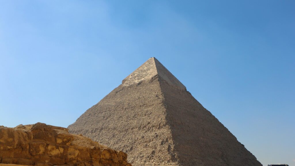 Majestic Great Pyramid of Giza under Clear Blue Sky 4K Wallpaper