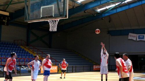 Basketball Player Shooting a Jump Shot During a Practice Game Desktop Wallpaper
