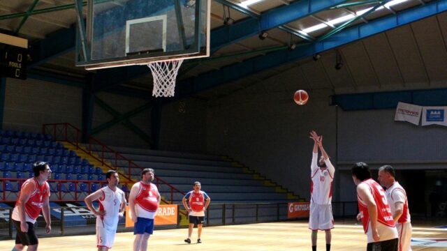 Basketball Player Shooting a Jump Shot During a Practice Game Desktop Wallpaper