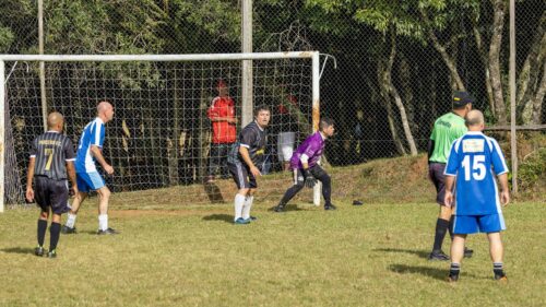 Amateur Soccer Players on the Field Action Shot Desktop Wallpaper