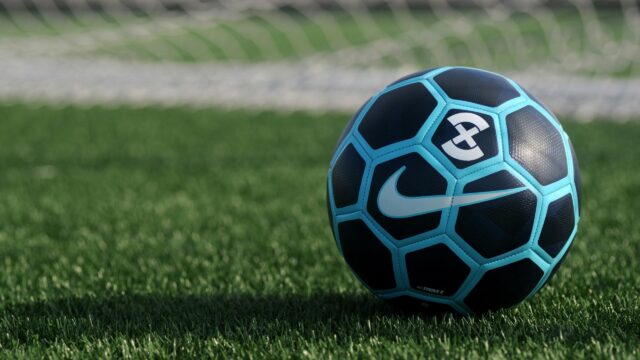 Nike Strike X Soccer Ball on Grass Field Desktop Wallpaper