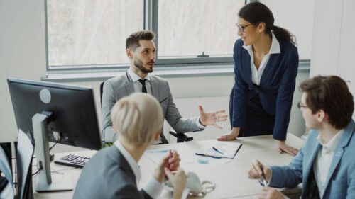 Professional Business Meeting in a Modern Office Desktop Wallpaper