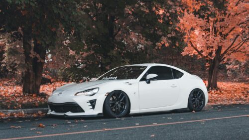 Modified White Toyota 86 Sportscar in Autumn Foliage 4K Wallpaper