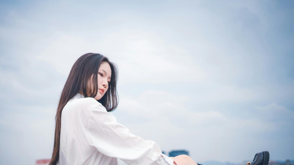 Beautiful Asian Girl in White Shirt Looking Away 4K Desktop Wallpaper