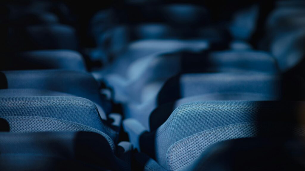 Cinematic Empty Movie Theater Seats 4K Wallpaper