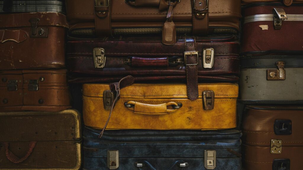 Vintage Stacked Leather Suitcases Retro Aesthetic 4K Wallpaper
