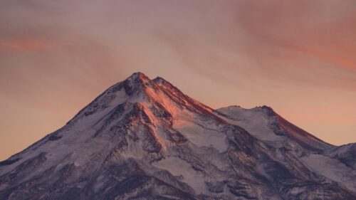 Majestic Snow Capped Mountain Peak at Sunset 4K Desktop Wallpaper