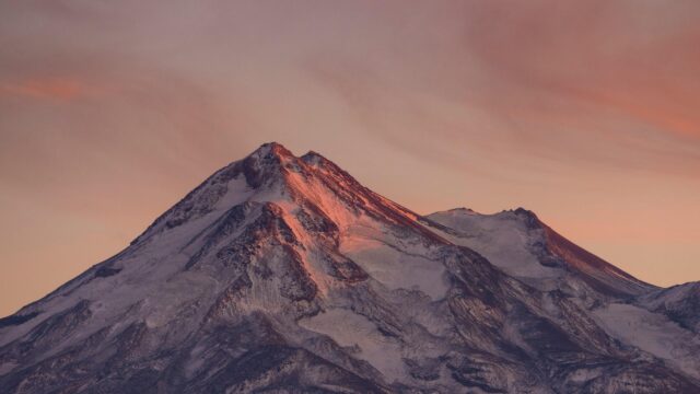 Majestic Snow Capped Mountain Peak at Sunset 4K Desktop Wallpaper