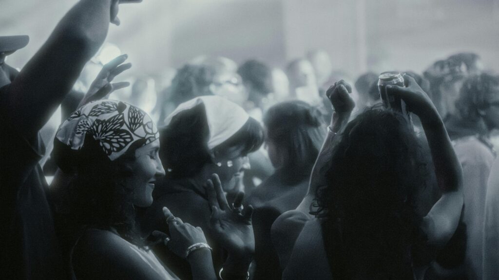 People Dancing at a Festive Night Club Concert Desktop Wallpaper