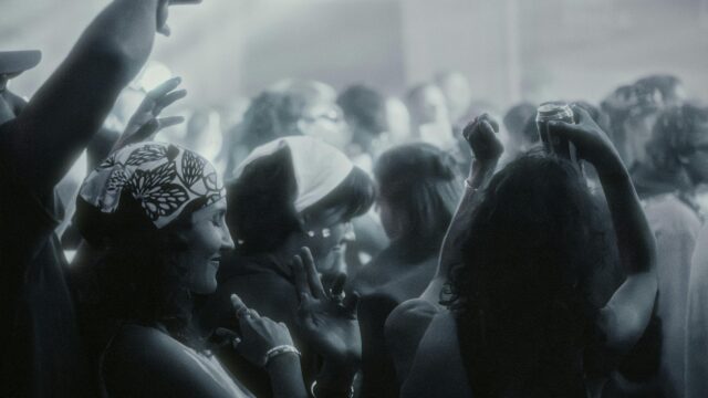 People Dancing at a Festive Night Club Concert Desktop Wallpaper