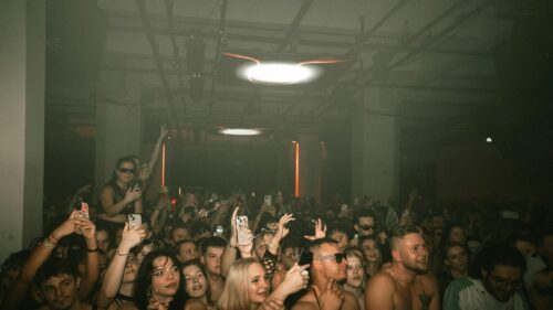 Energetic Nightclub Crowd Concert Party 4K Wallpaper