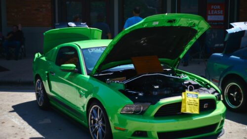 Neon Green Roush Mustang Sports Car at Outdoor Car Show Desktop Wallpaper