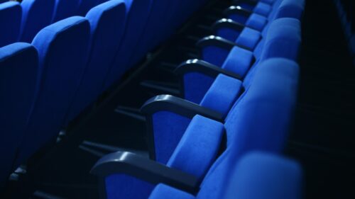 Empty Blue Cinema Theater Seats Row 4K Desktop Wallpaper