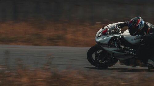 Triumph Daytona Sportbike Racing at High Speed Desktop Wallpaper