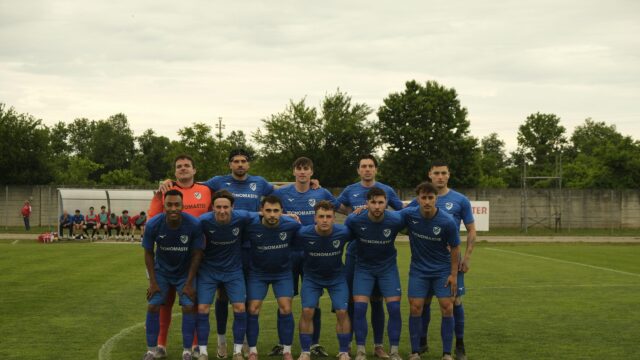 Soccer Team Posing for a Professional Group Photo 4K Wallpaper