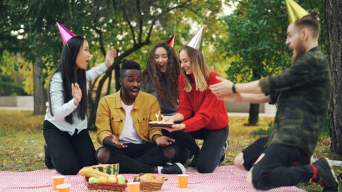 Friends Celebrating Birthday Outdoors Picnic Party 4K Wallpaper