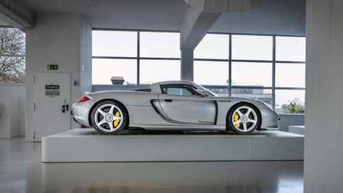 Silver Porsche Carrera GT Sports Car at Museum 4K Wallpaper