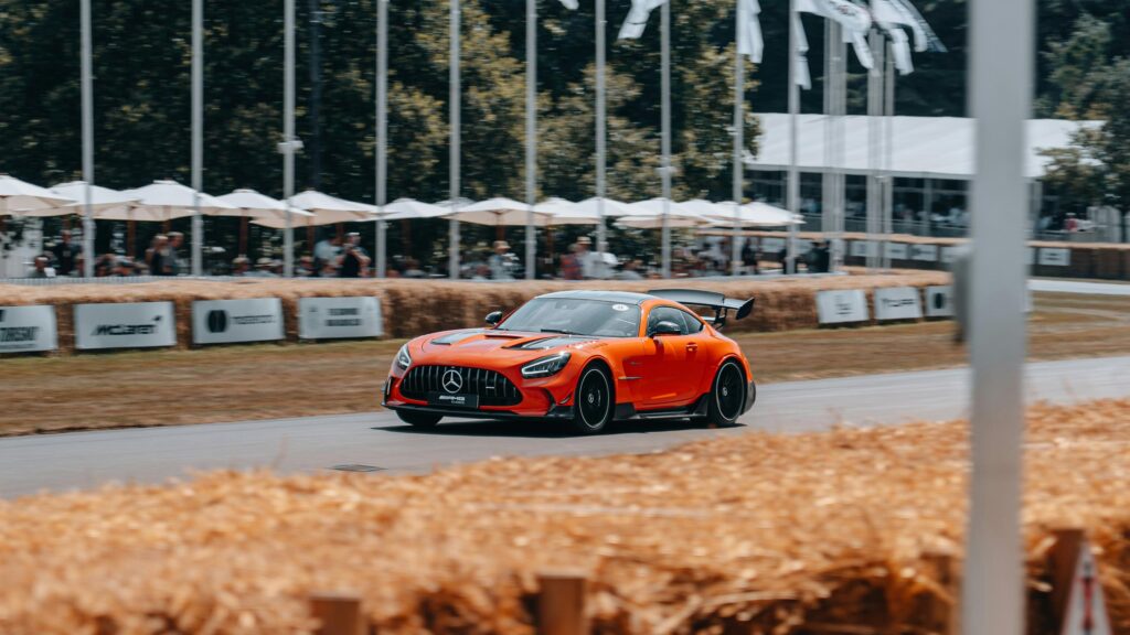 Orange Mercedes-AMG GT Black Series Racing on Track 4K Desktop Wallpaper