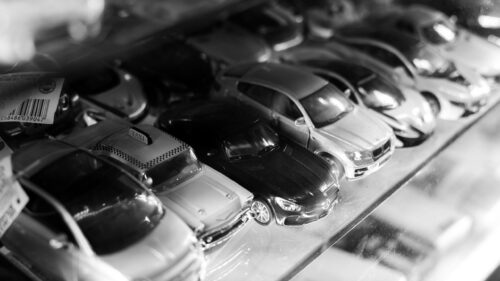 Miniature Car Collection Display Shelf Black and White 4K Wallpaper