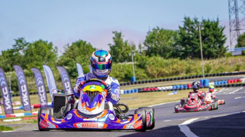 Professional Kart Racing Driver in Action 4K Desktop Wallpaper