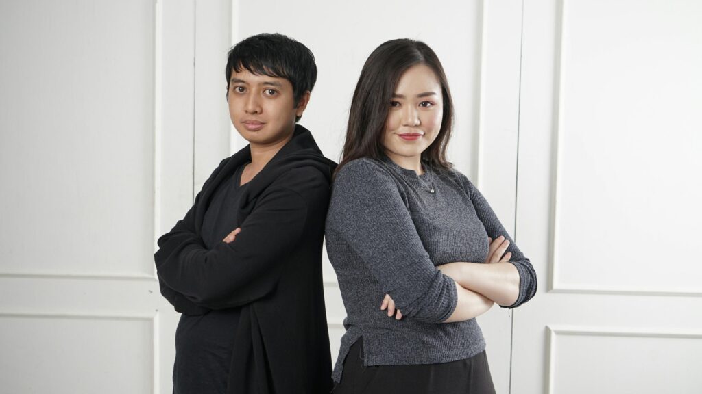 Professional Asian Couple Back to Back Portrait 4K Wallpaper