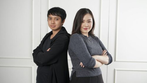 Professional Asian Couple Back to Back Portrait 4K Wallpaper