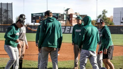 Northwest Missouri State Baseball Players Team Huddle 4K Wallpaper