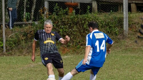 Intense Amateur Soccer Match Action Shot Desktop Wallpaper