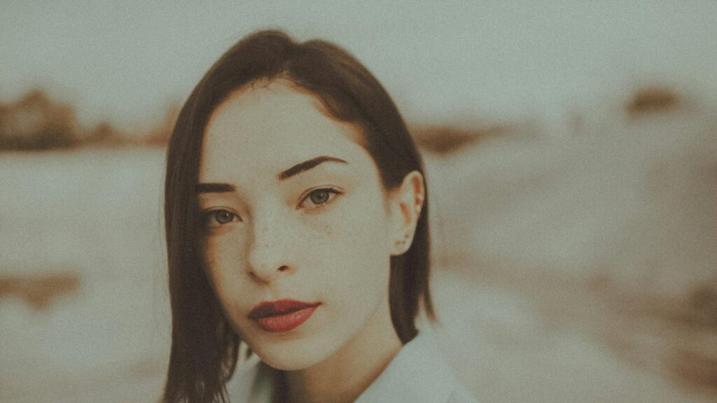 Portrait of a Beautiful Young Woman with Red Lips Desktop Wallpaper