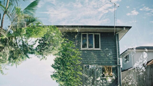 Dreamy Double Exposure House with Palm Trees 4K Wallpaper