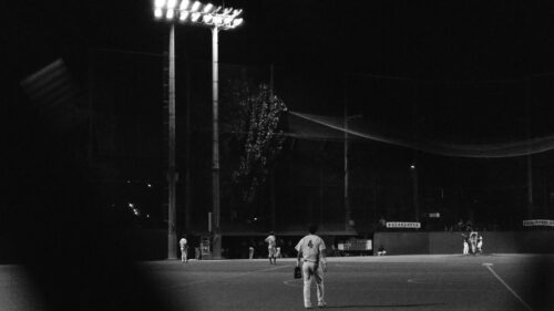 Night Baseball Game Under Stadium Lights Cinematic Desktop Wallpaper