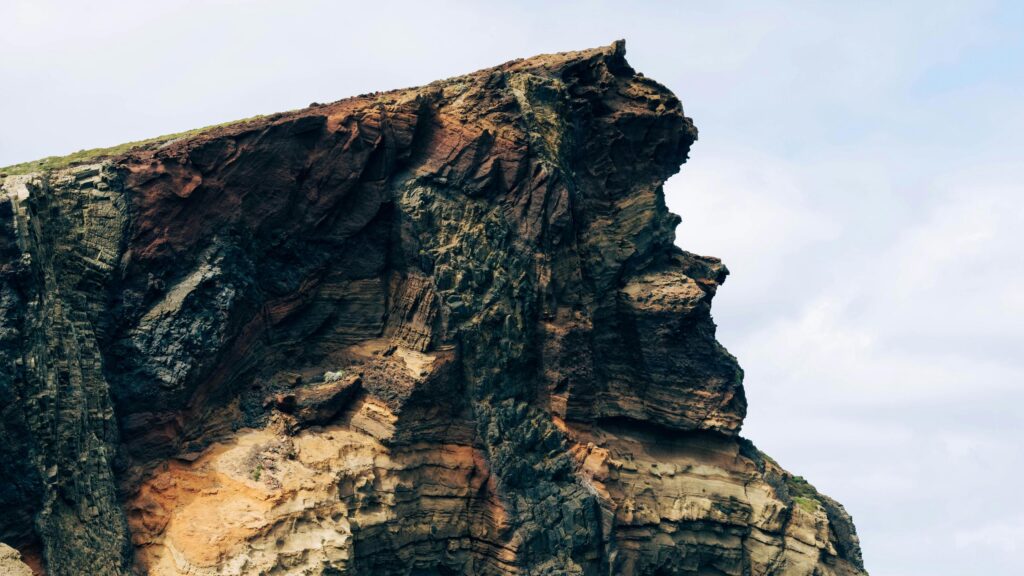 Dramatic Volcanic Coastal Cliff Face 4K Desktop Wallpaper