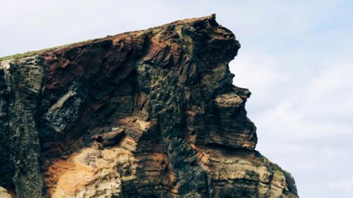 Dramatic Volcanic Coastal Cliff Face 4K Desktop Wallpaper