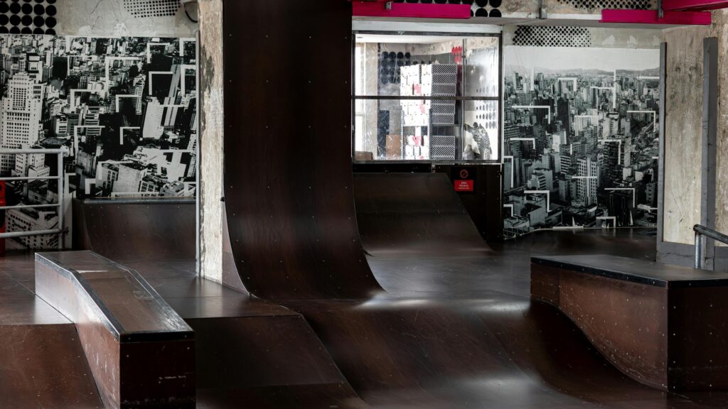 Indoor Skate Park with Urban City Mural Art 4K Wallpaper