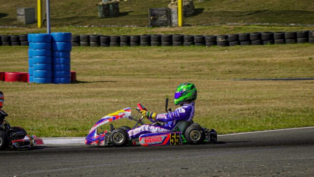 Go Kart Racing Action on Circuit Track 4K Desktop Wallpaper