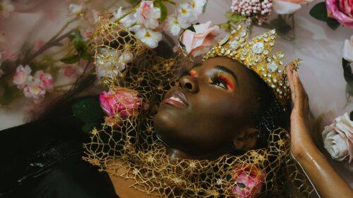 Stunning Black Queen with Golden Crown and Floral Bath Desktop Wallpaper