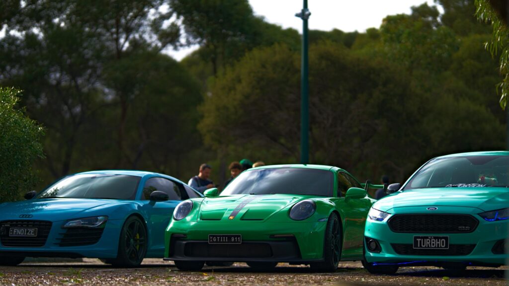 Stunning Sports Car Trio Green and Blue Supercars 4K Wallpaper