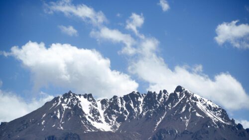 Snowy Mountain Peak Under Blue Sky Desktop Wallpaper