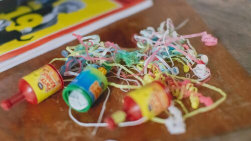 Celebration Party Poppers and Colorful Streamers 4K Wallpaper
