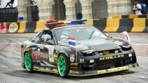 Black Nissan 240SX Drift Car with Police Lights Desktop Wallpaper