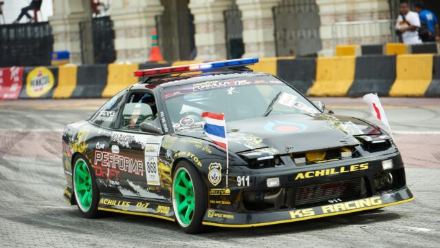 Black Nissan 240SX Drift Car with Police Lights Desktop Wallpaper