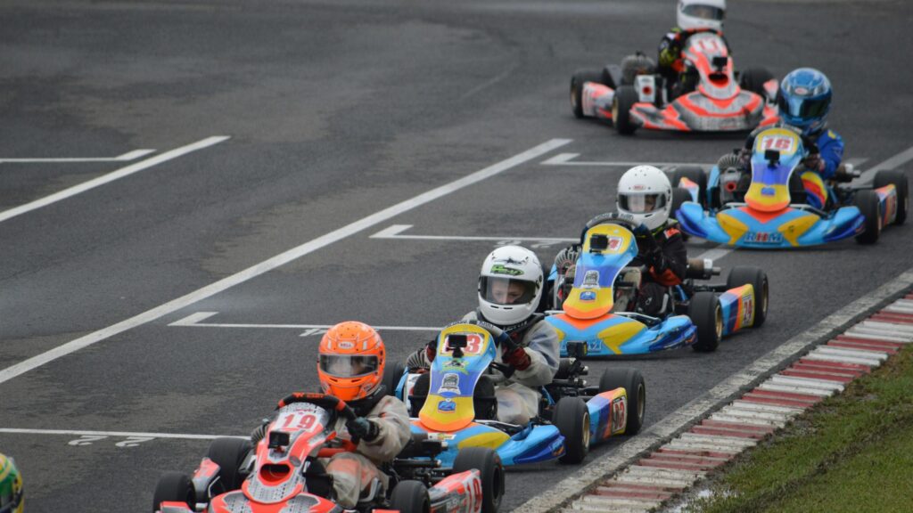 Kart Racing Action on the Track Desktop Wallpaper