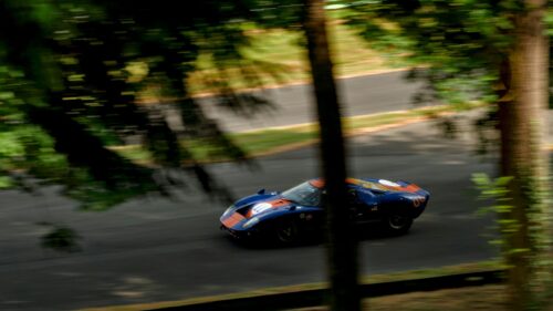 Ford GT40 Race Car Speeding on Track 4K Desktop Wallpaper