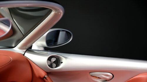 Luxury Sports Car Interior Detail with Red Leather and Silver Trim Desktop Wallpaper