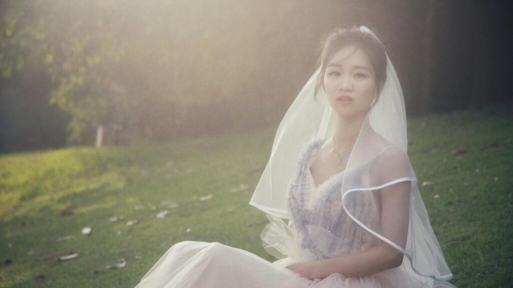 Ethereal Asian Bride in Golden Hour Meadow 4K Desktop Wallpaper