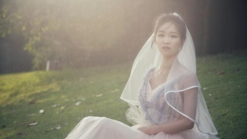 Ethereal Asian Bride in Golden Hour Meadow 4K Desktop Wallpaper